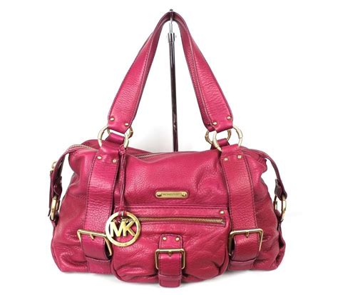 michael kors magenta bag|Michael Kors voyager bags.